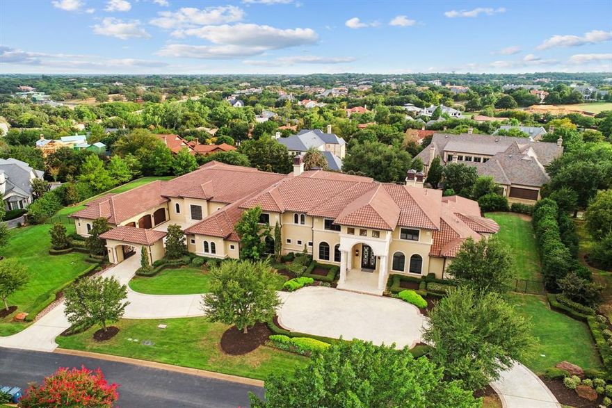 This home has 14,000 square feet of luxurious living space, you can expect nothing but the best. The property boasts a range of top-of-the-line amenities that are sure to impress even the most discerning of homeowners! It is truly a dream come true for anyone who loves to have fun and stay active. With amazing amenities such as a bowling alley, half-court basketball court, gym, and even a hair salon, you'll never run out of things to do. Imagine bowling with friends on a rainy day, shooting hoops with your kids, or taking a dip in your sparkling pool! You'll love spending time outside, soaking up the sun, and enjoying the beautiful surroundings. There's also plenty of outdoor living space, where you can relax and unwind with family and friends. So why settle for a boring, ordinary home when you can have a one-of-a-kind home? With close proximity to DFW Airport, Shopping, dining, and more, your adventures are endless! Come see this amazing property today and start living your best life!