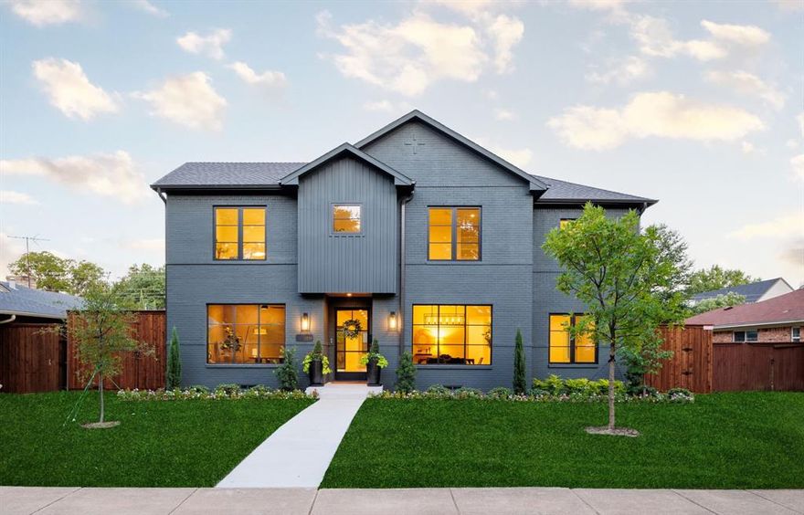 Artfully crafted,this stunning Lakewood home blends modern design with timeless elegance.Step inside the steel front door to enjoy 4 inch white oak flooring,white oak beams & smooth finished walls.Extraordinary family room with vaulted ceiling & expansive sliding door leading to covered outdoor living.The kitchen boasts Mont Blanc quartzite countertops,custom cabinetry,& high-end appliances from Subzero,Wolf,& Miele.Stylish bar is well-appointed with floating glass shelves,Thermador wine column,beverage fridge & ice machine.With 4 bedrooms + 4.2 bathrooms + study + upstairs game room, each space offers luxury & comfort.Spacious primary suite with swoonworthy bath featuring Taj Mahal quartzite & WIC. Designer lighting & custom oak millwork highlight meticulous attention to detail. Amenities include RAM thermally broken aluminum windows,high-efficiency Trane HVAC,& foam insulation.This home epitomizes sophisticated living with every element crafted to perfection.Steps to White Rock Lake.