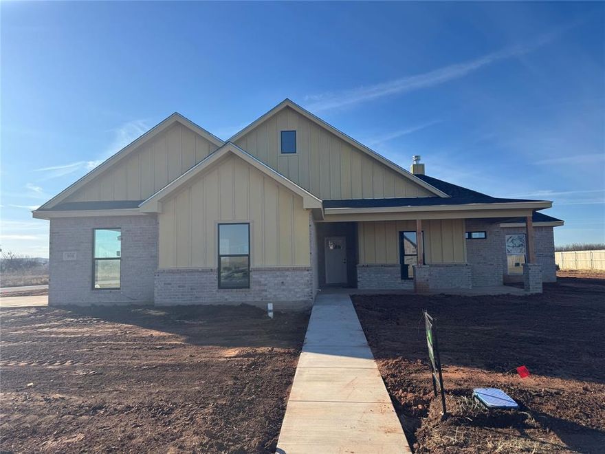 agent-owner relationship - Welcome to your dream home! This stunning new residential construction features a charming front porch, perfect for relaxing evenings. Step inside to find a spacious living room with an inset woodburning fireplace seamlessly connected to a large kitchen, complete with a beautiful island ideal for casual dining or enjoying meals in the inviting open breakfast nook. The kitchen also boasts an oversized walk-in pantry for ample storage. Retreat to the large primary suite, showcasing a beautifully vaulted ceiling and an expansive primary bathroom with a generous walk-in closet. For added convenience and privacy, a custom-built office is located just down the hall from the primary bedroom. Rounding out this exceptional property is a 2-car garage, providing plenty of space for vehicles and storage. You’ll discover wood-look tile floors throughout the home. While it may be hidden from view, the property is also equipped with spray foam insulation, which aids in reducing outside noise and helps keep electricity costs lower. Don't miss the chance to make this extraordinary house your home!