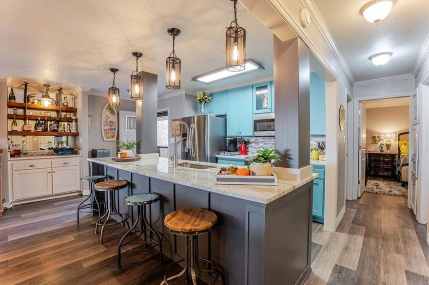 Nestled within the highly desirable Gaines Bend community on Possum Kingdom Lake, this fully furnished 3-bedroom, 2-bath waterfront condo offers an effortless blend of comfort, space, and lake-focused living. Positioned as a bottom-level end unit, the home captures sweeping, unobstructed lake views that stretch across the water and create a constant connection to the outdoors.

The kitchen anchors the home, flowing seamlessly into a generous living and dining area designed for gathering, entertaining, or simply relaxing after a day on the lake. Large windows draw natural light into the space while framing picturesque views of the shoreline and open water beyond.

Step outside to the covered patio, an ideal vantage point for morning coffee, sunset evenings, and watching the steady rhythm of boating activity pass below. Each condo owner enjoys access to a dedicated covered boat slip, with tram access providing easy transportation between the residence and the marina—making spontaneous lake days a way of life.

Located within a gated waterfront community, the property also offers covered parking, along with close proximity to a private marina and boat ramp. Whether used as a full-time residence, weekend escape, or lock-and-leave lake retreat, this condo delivers the ease and enjoyment of Possum Kingdom Lake living at its finest.