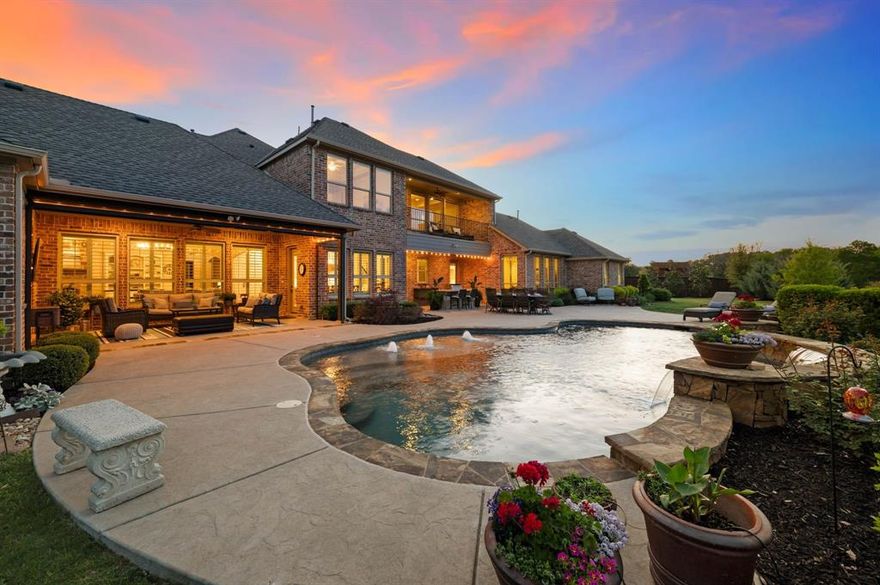 BACKING TO GREEN BELT AND ATTACHED FULL APARTMENT! PERFECT FOR MOM and great MULTI GENERATIONAL LIVING GUEST HOUSE. Enjoy privacy on this 1.2-acre cul-de-sac lot, featuring a custom home offering ultimate privacy, backing to peaceful trails, parks, and a tranquil lake. A private retreat, it includes an attached MOTHER IN LAW APARTMENT GUEST HOUSE with a separate entrance and private garage. Perfect for mom, nanny, visitors or extended family. The Bear Creek Trail system is just steps away from your backyard, providing direct access to miles of scenic trails. Additionally, you're only a five-minute walk from Keller Town Center, The Keller Pointe, the K-9 Dog Park, and the vibrant community events of Keller. Beautiful hand-scraped hardwood floors throughout, private office with French doors and built-ins. Plantation shutters and stunning light fixtures enhance the home's charm. The expansive living room boasts a floor-to-ceiling stone gas fireplace, built-ins, and a wall of windows. Gourmet kitchen is a chef's dream with oversized island, natural stone countertops. Thermador appliances a commercial-grade gas range, and a built-in refrigerator. The downstairs primary suite is a true retreat, offering a cozy seating area, a large walk-in closet, and a spa-like bathroom. Upstairs, you'll find two spacious bedrooms, a Gameroom, Media room, and a balcony with spectacular views of the lush greenbelt behind the home. The backyard is an entertainer's dream, featuring a built-in grill, a sparkling pool, a covered patio with automatic screens, and plenty of open yard space. The attached guest quarters offer a full kitchen with Bosch appliances, living room, 1 bedroom, 1 full bathroom, and laundry room, providing independence for guests. Conveniently located near DFW, Love Field, and Alliance airports, with quick access to highways 114 and 121, as well as nearby Southlake, Westlake, Fort Worth, and Dallas, this home offers the perfect balance of privacy and accessibility.