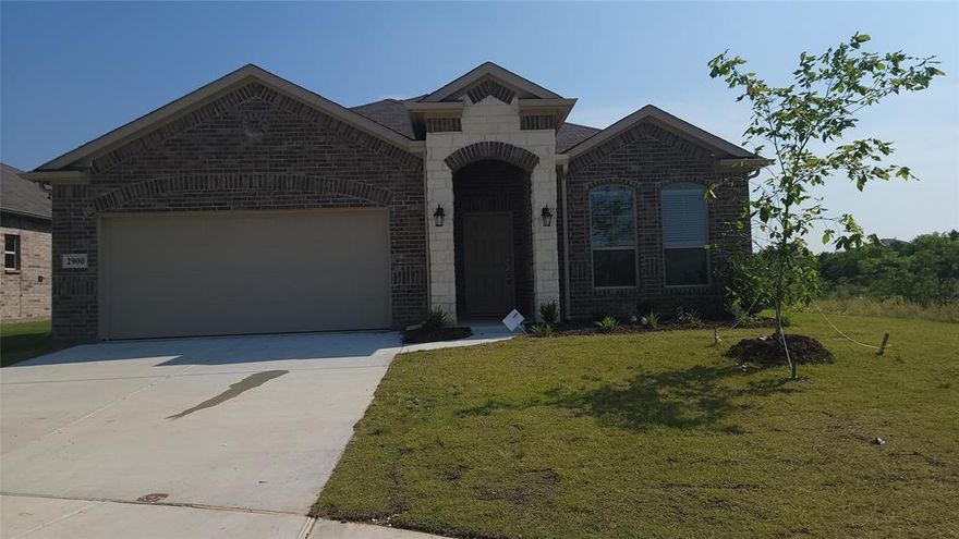 Gorgeous NEWER CONSTRUCTION HOME! Spacious, open concept living, dining and kitchen. Beautiful engineered hardwood floors in the living room. Fabulous kitchen with tons of storage, granite counters, walk in pantry and island for easy entertaining. Large primary bedroom with en-suite featuring dual vanities, toilet closet, soaking tub, walk in shower and large walk in closet. Two additional bedrooms are spacious with hall bath. Fourth bedroom is isolated with tons of natural ight and large closet. Oversized utility room with full size washer and dryer hookups. Two car garage, covered back porch and wood privacy fence.  This home has upgraded features with throughout. Walking distance to elementary school.