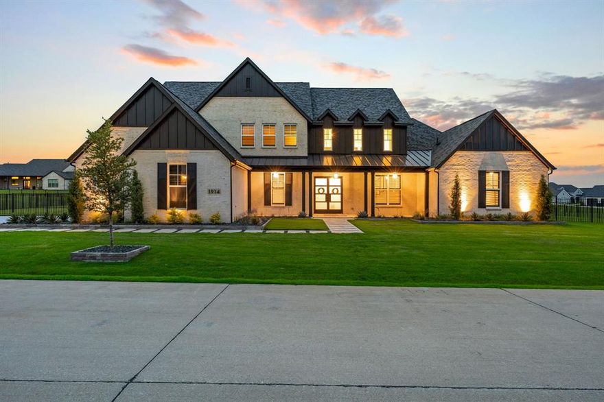 Sellers are willing to repaint the kitchen cabinets to a different color, concept photos are depicted on listing photos. Experience the ultimate blend of luxury, comfort, and modern design in this showstopping custom farmhouse on a beautifully landscaped 1-acre lot. The open-concept living area is anchored by a statement fireplace and flows into a chef’s dream kitchen featuring quartz countertops, commercial-grade appliances, soft-close cabinetry, farmhouse sink, walk-in pantry, and an oversized island perfect for entertaining. Adjacent dining space overlooks the backyard oasis through panoramic windows. The spacious primary suite is a true retreat with dual walk-in closets and a spa-inspired bath showcasing a massive walk-through shower with dual shower heads and a central rainfall fixture. Secondary bedrooms are generously sized with walk-in closets and premium finishes. A soundproofed media room delivers the ultimate movie or gaming experience. The dedicated home gym equipped with epoxy floors is perfect for workouts, hobbies, or office use. Enjoy endless hot water with two tankless heaters, a 1000-gallon propane tank, and a full-home generator for uninterrupted power. The oversized 3-car garage features epoxy flooring and a universal EV charging outlet. Step outside into a private backyard paradise. Custom 2023 saltwater pool and spa, sun shelf, and water features are surrounded by lush landscaping. Practice your short game on the turf putting green or unwind at the covered patio complete with a fully equipped outdoor kitchen—grill, sink, fridge, and bar seating included. Multiple seating areas, ambient lighting, and room for games or gatherings make this an entertainer’s dream. This property offers luxury, comfort, and functionality inside and out. Built to impress and designed to perform, it’s a rare opportunity to own a turnkey showpiece with every upgrade imaginable. A must-see to truly appreciate the craftsmanship, layout, and lifestyle.