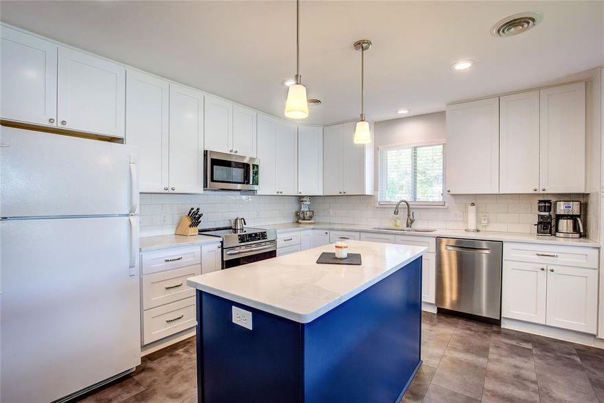 Discover the perfect mix of vintage charm and modern living in this beautifully updated 3-bedroom, 2-bath home! Built in 1958, this classic features gorgeous original hardwood floors, a fully remodeled kitchen, and primary bath. The original secondary bath adds a touch of mid-century personality you'll love. With all new windows bringing in natural light and efficiency, this home is move-in ready and full of character. A true gem that combines timeless style with today's updates.