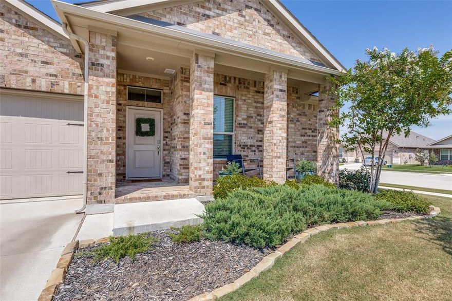 You'll love living in Northstar, a master planned community located just North of Ft. Worth. This 4-2-2 1 story home is well designed with a spacious living area, brick covered front porch, expanded back patio with wall mounted TV, sun shades & sizable level backyard with no homes behind for privacy.  Easy care wood look tile throughout with carpet in bedrooms only. Stylish island kitchen with upper and under cabinet lighting, corner pantry, gas range, bar seating and upgraded pendant lighting. Framed mirrors, drapes, rods & shower curtain remain, fans, keyless front entry, Ring doorbell, tankless water heater, gas stub for patio grill, full gutters, security system w glass breakage & exterior camera, neighborhood served by ATT. You will have many opportunities to meet neighbors with community features including a top notch amenity center with flexible indoor event space, an on site lifestyle director, playground with shade structures, resort sized pool, splashpad, paved fitness trails with stunning views pass through parks and soccer fields. Northwest ISD is one of the best in the region and Molly Livengood Carter Elementary is in the neighborhood. 10 Year Transferrable Structural Warranty. Seller willing to give a buyer credit for rate buy down or closing costs. Property is eligible for USDA 100% financing. See info in supplements.