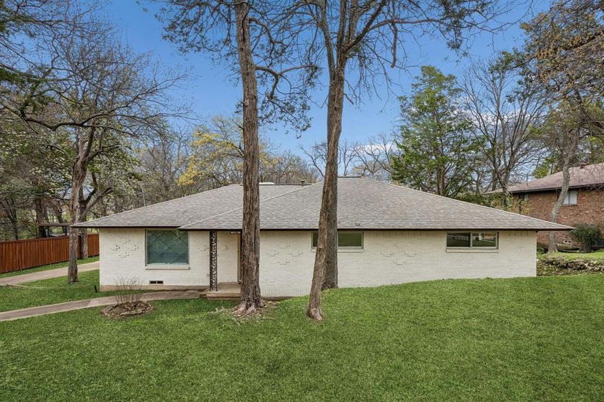 Welcome to 1106 Lady Lane, a spacious mid-century ranch residence built in 1964 offering approximately 1,960 square feet of versatile living space on a generous lot. This property blends classic architectural character with current interior renovations, creating an appealing opportunity for buyers searching for vintage charm combined with updated finishes. The home features 3 bedrooms and 2.5 bathrooms, with a flexible layout that includes the option to configure a fourth bedroom, office, or creative workspace. It is located close to several sought-after charter schools. Recent interior improvements include new flooring, fresh interior paint, and updated lighting, providing a refreshed look while maintaining the distinctive feel of mid-century design. A large central living area offers an inviting space for gathering, anchored by architectural details that reflect the era’s emphasis on open, functional rooms. The kitchen provides ample cabinetry and workspace, allowing for easy daily use while offering room for future personalization. The property also includes a two-car garage with additional storage space. Outside, the fenced backyard provides open space suitable for outdoor seating, gardening, or recreational use. Located in an established neighborhood, 1106 Lady Lane combines the scale of a classic ranch floor plan with ongoing interior updates. The result is a home that delivers character, flexibility, and convenience for buyers seeking a well-located property with room to adapt over time.