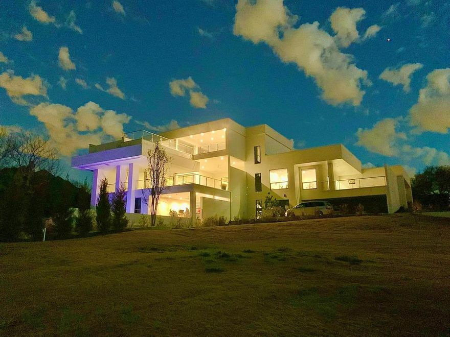 BROKER OPENING ON OCTOBER 3rd FROM 2PM UNTIL 4PM

Exquisite modern on the golf course in the Las Colinas gated community of Fox Glen. This main level boast a split floor plan.  Master suite has separate his and her bathrooms as well as 3 more large bedrooms 3 full baths and a half bath.  The remaining 6 bedrooms are on the lower level, 2 of which are suites. 2 conference rooms, large snack bar complete with ice cream maker designed for corporate guest. Two swimming pools (salt & chlorine) It even has a Night Club room designed for parties with sound padded walls.  Solar powered!  High end Miele appliances. Lots of sly lights and natural lighting. Huge semi finished basement