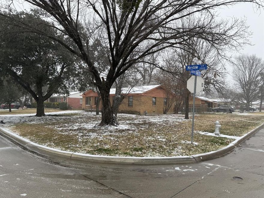 Here is an excellent flip house or rental opportunity, even better for end user. Sits on a nice big corner lot with plenty of room to build a nice size garage in the back yard with side entrance. Nice storage shed in back on a concrete foundation. This house needs foundation repair and new electrical. Garage has already been closed in. Suggest taking the converted garage and adding a wall for a fourth bedroom and add a second bathroom to make this a 4-2. Sewer line is already PVC to the street. Most of the water lines have been converted to pex. Water heater is 7 years old but looks new. Gas range has been replaced recently. Original Hardwood Floors. Three good producing native pecan trees. A kitchen and bath update and all new flooring would be necessary to bring top dollar for this old gem. ARV (after repair value) would be around $279k. Remodel would run around $60-70k. Make a quick 40k or if you decide to live in it, you would instantly have $40k equity. Buyer to pay for new survey. AS-IS, no repairs.