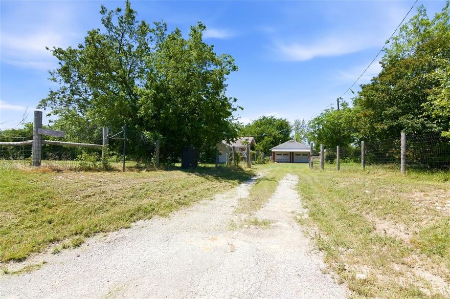 6.2 Acres of land on the service rd of Hwy 287, lined with trees.  Just West of Haslet, in far north Ft Worth.  3 Bedroom 2 Bath, 2 each 2 car detatched garages and 2 each 1 car garages and lots of pasture for Animals.  The House needs some updating.  Eazy access to the Highway.  lots of room for just about anything.  Close to shoping and major roadways.  Less than 30 minutes to downtown Ft Worth.  Outside the city limits.