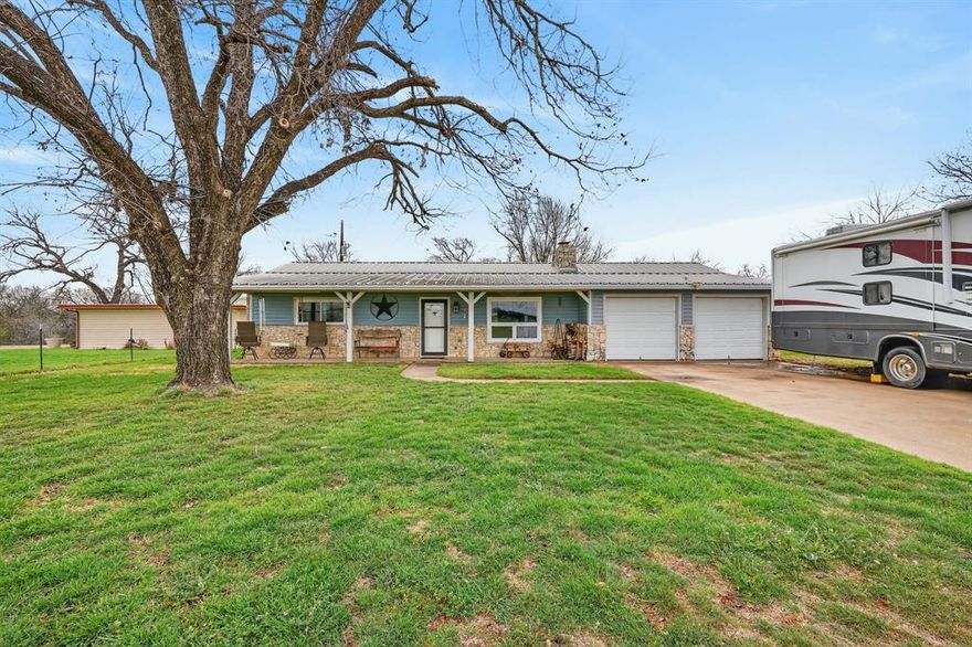 WATERFRONT SANCTUARY: 2 ACRES of UNRESTRICTED Freedom. Modern Living Meets Workshop Heaven on Long Creek!

Escape to two acres of peaceful waterfront living at the end of a quiet, dead-end road. This beautiful 3 bedroom, 2 bathroom home offers the perfect balance of interior comfort and outdoor utility, with direct water access leading to the Brazos River and Lake Granbury.

Step inside to an open concept floor plan anchored by a stunning floor-to-ceiling rock fireplace, the ultimate centerpiece for cozy Texas evenings. The chef’s kitchen boasts sleek granite countertops and flows seamlessly into a large dining room designed for hosting memorable family dinners.

Need a sunroom, a home gym, or a creative studio? The flexible back bonus room features private access to the open-back patio, making it an ideal hobby room or a serene additional bedroom. End your day on the covered front porch, perfectly positioned to capture breathtaking Texas sunsets.

The Ultimate 1,200 SQFT Workshop
For the hobbyist, mechanic, craftsman, or small business owner, the 30x40 Quonset Shop is a game-changer. Built on a solid slab, this workspace includes spray foam insulation, electricity, and water already on-site. It also features a bonus loft space for additional storage or an elevated office. An RV hookup is located conveniently on the property for travelers or guests.

Outdoor Living & Water Access
Experience the best of Life on the Creek. Whether you’re fishing, kayaking, or simply relaxing by the water’s edge, this property is designed for nature lovers. The grounds include a large fenced backyard, privacy fencing on one side, and a dedicated dog run. Enjoy mature trees and a peaceful, end-of-the-road location with NO HOA restrictions.

Experience the freedom of acreage with the comforts of a cozy, modern home, all just 13 minutes from the Historic Granbury Square.