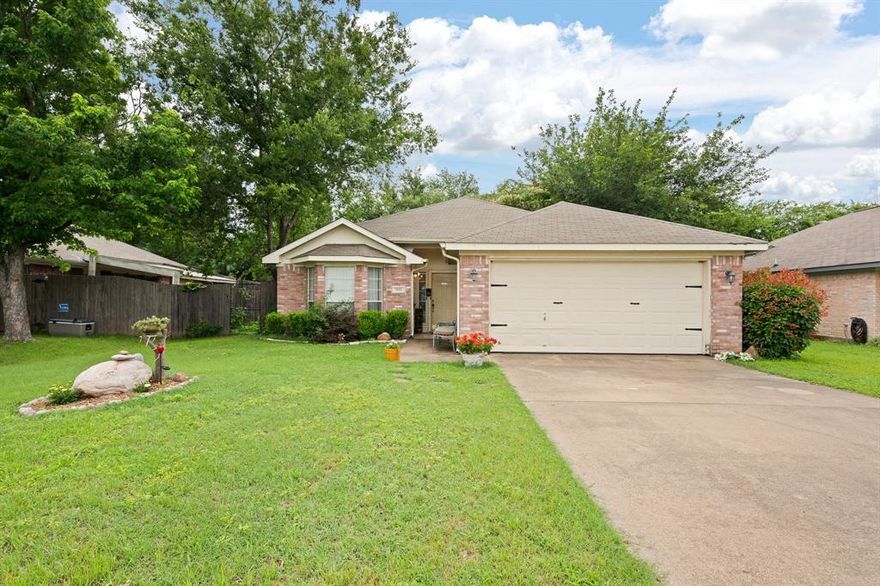 Welcome to this one-owner brick home offering solid potential with just a few minimal updates needed. Featuring 3 bedrooms, 2 full bathrooms, and a 2-car garage, this property is being sold as-is, presenting a great opportunity for customization. The home offers a spacious living room with abundant natural light, large windows, and a cozy wood-burning fireplace-perfect for relaxing or entertaining. The kitchen is generous in size with a large pantry, electric range, dishwasher, and a stainless steel refrigerator that can stay with an acceptable offer. The primary suite easily accommodates a king-size bed and furniture, with an attached bath that includes a large vanity, soaking tub and a separate shower. Both guest bedrooms are nicely sized with closets and the hall bath features a tub-shower combo and under-vanity storage. Outside, step into your own private oasis with a fenced backyard, flowing pond and several Japanese maple trees that offer stunning seasonal color in the fall. It's an ideal space for enjoying quiet mornings or entertaining outdoors. The water heater was replaced in June 2025. While the HVAC system needs repair, window units have been installed for continued comfort. Located close to shopping, dining, and everyday conveniences, this home is a rare find with solid structure, charming features, and a beautiful outdoor setting.