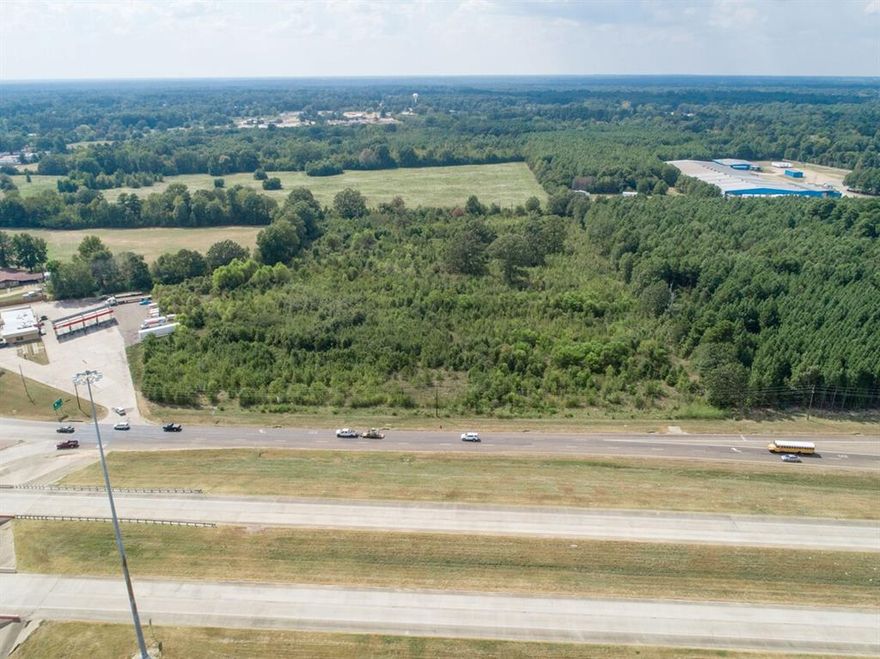 This expansive 13.34 Acre parcel of land boasts an unbeatable location, situated off the busy intersection of Hwy 369 and S. Lake Drive in Texarkana, Texas. Strategically positioned amidst a burgeoning commercial landscape, this land parcel is perfectly suited for a variety of development ventures. Its ample size and strategic location make it an ideal choice for those looking to capitalize on the region's growing demand for a modern storage facility, dynamic commercial retail strips, sleek hotels, motels complex, and large scaled warehouses.  Don't miss out on this rare opportunity to stake your claim in the Ark-La-Tex Region!