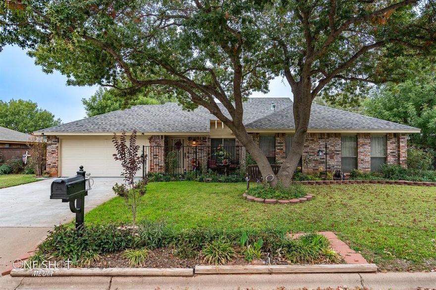 This beautiful 3 bedroom 2 bath house has all the charm and updates throughout! This home has an open floor plan, vaulted ceilings, and pretty title floors throughout. The living room has large vaulted ceilings and brick wood burning fireplace. The kitchen is an eat in kitchen with dark cabinets, a new dishwasher, and electric flat top stove. The primary retreat is very spacious with vaulted ceilings and its own en-suite. Out back there is a large backyard with beautiful mature trees, back porch, and a storage shed. This homes hot water heater was updated in 2022, new north windows in the office in 2022. Schedule your showing today cause this beauty wont last long!