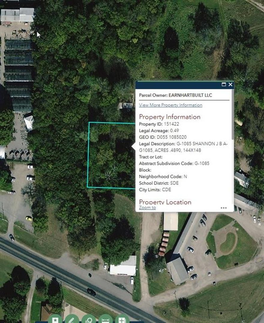 Lot for sale in the growing town of Denison! Zoned single family. Agent to do their own due diligence with city requirements. Heavily wooded, no sewer, unplatted. Good place for storage or shops.