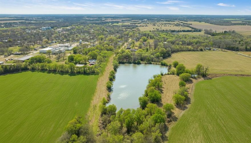 Located on Market Street in the heart of Roxton, this 10.65-acre property offers a rare opportunity to own a beautiful piece of Northeast Texas countryside with a scenic pond and wide-open views.
The land features a mix of open pasture and scattered trees, creating the perfect balance of usability and natural beauty. A picturesque pond serves as the centerpiece of the property, ideal for livestock, recreational fishing, or simply enjoying peaceful waterfront views.
With level to gently rolling terrain, this acreage provides multiple potential homesites overlooking the water and surrounding fields. Whether you’re looking to build your dream home, establish a small ranch, or invest in land with development potential, this tract offers flexibility and space to bring your vision to life.
Enjoy the quiet charm of small-town living while still being within convenient reach of surrounding communities. If you’ve been searching for land with water, privacy, and possibilities — this 10.65 acres on Market Street is ready to make it yours.

LEGAL DESCRIPTION: DENTON'S 3RD ADDITION BLOCK PT OF 15, A 48 E BARNETT SURVEY, ROXTON CITY LAKE, ACRES 9.75, DENTON'S 3RD ADDIITON, BLOCK 15, LOT S 23 OF 2-3, MARKET ST.