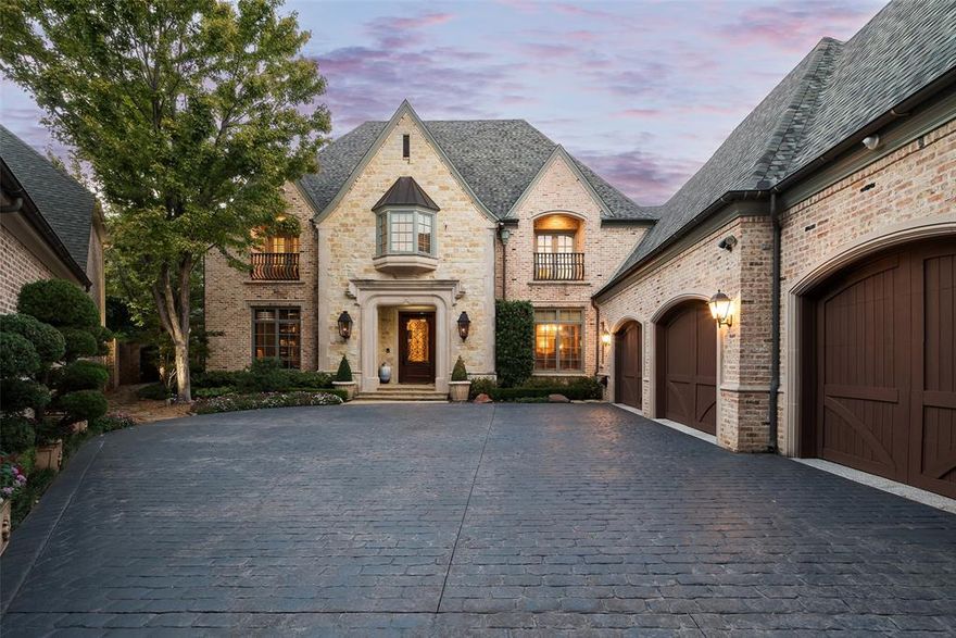 Situated on nearly half an acre in one of Glen Abbey’s most desirable locations, this exquisite Hawkins Welwood-built home has been elevated in recent years under the design direction of Lori Golman to offer a truly updated, custom experience. Against the backdrop of the championship tee box of the 3rd hole at Bent Tree Country Club, enjoy the vast backyard with a pool and spa, cozy fire pit, and covered outdoor patio equipped with heaters and speakers—all perfect for entertaining. A spacious courtyard with water feature, pergola and fans provides another shady option for al fresco dining. Inside, revel in 11-foot ceilings and a gourmet kitchen boasting a Wolf cooktop, Thermador double ovens, and a Subzero fridge and beverage drawers. The luxurious master suite includes his and her baths and closets and a luxe chromatherapy shower. Lavish media room is outfitted with soundproof walls, wet bar and lighted cabinetry and designer accent lighting. The stately private study offers ample room for additional seating and two hidden closets for storage. The fourth bedroom suite conveniently doubles as a living area and pool bath, and an adjacent sunny gardening room enhances the home's allure. Oversized utility room provides a second work-from-home area, with built-in work station overlooking the courtyard. Top-tier updates include wall coverings by Phillip Jeffries, lighting by Visual Comfort and Ralph Lauren, and custom chandeliers by Paul Ferante in the breakfast room and kitchen island. Beyond the beautiful aesthetics, buyers will appreciate the recently replaced Lennox high-SEER HVAC systems, a whole house generator, and the spacious outdoor storage closet and walk-in attic storage. The prestigious Glen Abbey community, known for its serene ambiance and guard-gated security, makes this move-in ready property the epitome of executive living at its finest!