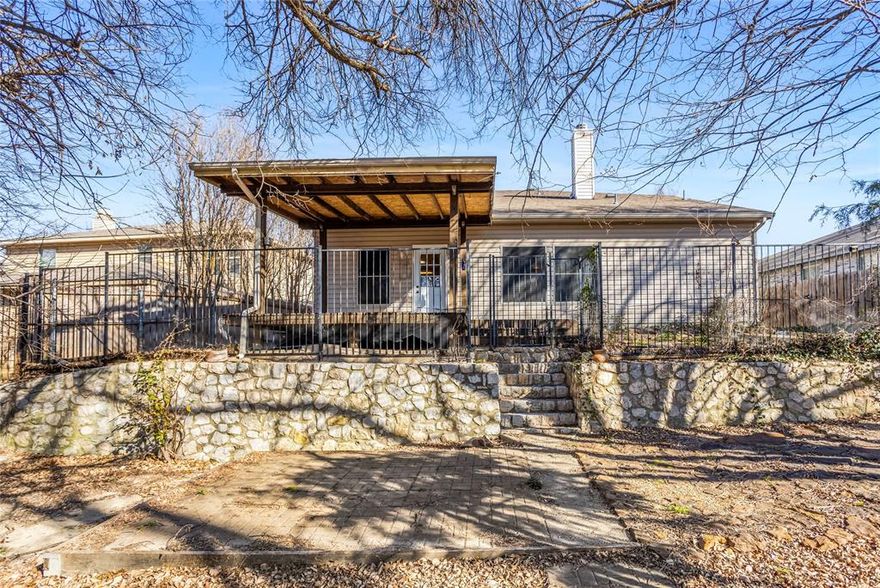 CREEK LOT with no neighbors behind you! Welcome to this 5-bedroom home in McKinney TX featuring 2,910 sqft, 2.5 baths, and a flexible layout designed for everyday living and entertaining. The living room centers around a wood burning fireplace and flows into both formal and casual dining spaces, including a breakfast area just off the kitchen. The kitchen includes built in cabinetry, electric range, microwave, dishwasher, and ample counter space for meal prep. The first floor primary suite offers dual sinks, garden tub, separate shower, and walk in closet. Ceiling fans throughout enhance comfort, and high speed internet is available. Situated on a 0.26 acre lot, the backyard includes a large covered rear porch providing space for outdoor gatherings and backs to the creek. Additional features include an attached 2 car garage with opener, composition roof, central heat and air. Located in Creek Hollow zoned to Naomi Press Elementary, Johnson Middle, and McKinney North High in McKinney ISD. The high school is within walking distance.