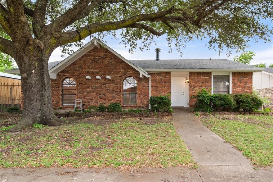 Completely renovated and move-in ready home located in desirable Duncanville ISD with an easy commute to Dallas, Arlington, and major highways. Towering tree offers shade to the front of this brick home. Sidewalks invite late afternoon neighborhood outings. Close to major highways for ease of commute. Close to park. This beautifully updated open-concept home features recent interior and exterior paint, updated carpet, and a roof replaced in 2026 for peace of mind. The remodeled gourmet kitchen is designed to impress with white shaker cabinets, stylish glass-front upper cabinets, tile countertops, stainless steel dishwasher, and stainless steel glass top range. Split bedrooms provide added privacy, making the layout ideal for families or guests. The spacious primary suite offers a fully updated bath with white vanity, framed mirror, ceramic tile flooring, elongated toilet, and walk-in shower. Guest bath upgrades include a white vanity, framed mirror, neutral ceramic tile flooring, elongated toilet, and updated tile shower enclosure. Another notable improvement includes wood privacy fence. This turnkey home combines modern updates, functional living space, and a convenient location in Duncanville ISD.