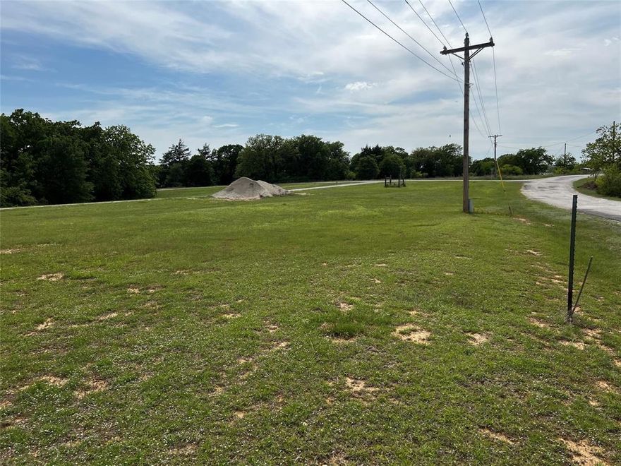 Lot is located on the main road in the improved subdivision of Oak Shores located on Lake Nocona. This lot is cleared and ready for your dream home close to the lake. It has road frontage on front and back sides. It is situated less than .5 mile from the serene waters, offering all the pleasures of lakeside living without the lakefront price tag. Just down the road is Boone Park, a community park featuring a public boat ramp and pristine picnic areas. Invite your friends and family for a day or weekend of camping, fishing, swimming, boating, sunset watching, etc. on the beautiful shores of Lake Nocona. Lot 198 can be purchased separately to have a combined lot size of .237.  Oak Shores is going through a major revitalization, so don’t miss out before the prices of properties explode.