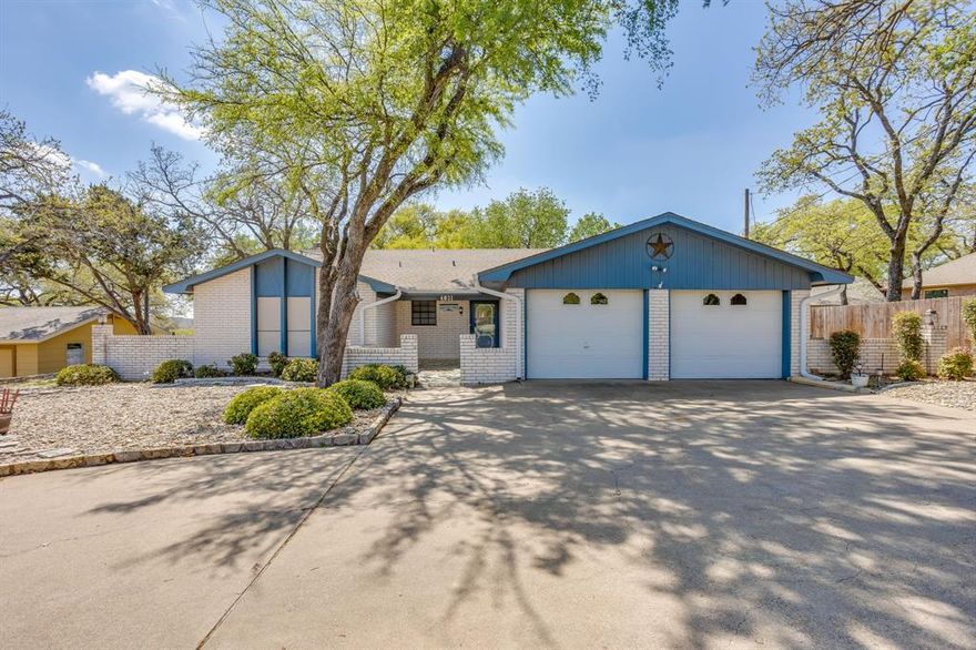 This property is located on the 18th hole of the golf course. Just steps away from the club house. The backyard has several trees providing shade and a great view of the golf course, lake, and the clubhouse. This property has covered porches, gutters, circular driveway, and the roof put on as recently as 2022. The Living Room is large and open to the dining area and kitchen. Windows across the back of the home provide light throughout. The ceiling is vaulted with a brick fireplace and built in shelves. The Kitchen has a built-in China cabinet, beautiful counters and many cabinets. Great place for cooking and entertaining.  Separate Utility Room. The Primary bedroom is very large with 2 walk-in closets. Primary Bedroom is split from other two bedrooms. The Garage has two doors facing the front of the home and a golf cart area with a door facing the side. The front porch has a courtyard area. This home is Move-In Ready.
There is a $10,000 buy in to the club that is to be paid by the buyer.