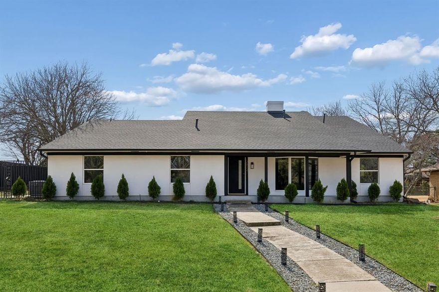 Discover your dream home in the heart of Farmers Branch! This completely renovated 1.5-story gem has been meticulously updated and is truly move-in ready. Just a short walk to beautiful Farmers Branch parks, including Mallon Park with its serene river walkways, the location perfectly blends convenience with natural charm. Step inside to sleek white walls and light hardwood floors that flow seamlessly throughout the open floor plan. The versatile formal living room, highlighted by charming bay windows, offers a welcoming space for a cozy sitting area with lovely front yard views. The grand living room showcases a dramatic floor-to-ceiling fireplace, creating a warm and inviting atmosphere ideal for both relaxing and entertaining. Tucked at the end of the living area, double French doors open to a private study, the perfect work-from-home retreat or quiet reading space. The spacious dining area transitions effortlessly into an exceptional kitchen featuring quartz countertops, crisp white cabinetry, a gas cooktop, and a stylish barn door concealing the pantry for a designer touch. The private primary suite serves as a serene escape, complete with a custom closet and a spa-inspired bath designed for ultimate relaxation. Generously sized guest bedrooms provide comfort and flexibility for family and visitors, while the upstairs game room offers endless possibilities as a media room, playroom, or additional lounge space. Step outside to your own backyard oasis. A covered patio with pergola overlooks the sparkling pool and spa, creating a peaceful, private retreat that’s perfect for entertaining or unwinding at the end of the day.