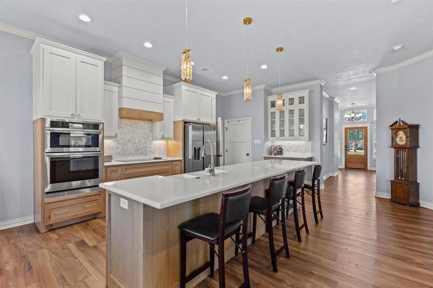 Welcome to this beautiful and spacious 5-bedroom, 3.5-bathroom home nestled on nearly 2 acres in one of Sherman’s most desirable areas. With its perfect blend of modern finishes and comfortable living, this property offers the space, style, and setting you’ve been looking for.
Step inside to an open-concept floor plan designed for both everyday living and entertaining. The large windows throughout the home invite in an abundance of natural light, creating a warm and inviting atmosphere. Gorgeous luxury vinyl plank flooring runs throughout the entire home, combining elegance with durability.
The kitchen is truly the heart of the home, featuring stunning white quartz countertops, ample cabinetry for all your storage needs, and a functional layout ideal for cooking and hosting. Whether you’re preparing a family dinner or entertaining friends, this kitchen is built to impress.
The oversized master suite is a private retreat with enough space to create your own relaxing sanctuary. The attached master bathroom boasts a spa-like feel, complete with a free-standing soaking tub, a beautifully tiled walk-in shower, dual vanities, and modern finishes throughout.
With four additional generously sized bedrooms and two and a half more bathrooms, there’s plenty of room for family, guests, or a home office setup. Each room is thoughtfully designed to offer comfort and functionality.
Step outside to enjoy the expansive backyard—completely fenced for privacy and peace of mind. The covered patio provides the perfect setting for morning coffee, evening gatherings, or weekend barbecues. The size of the lot offers endless possibilities, from gardening to adding a pool, workshop, or play area.
Located in a peaceful setting while still being just minutes from schools, shopping, and major highways, this home gives you the best of both worlds country space with city convenience.