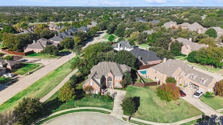 OPEN HOUSES NOV 22-23rd from 2-4 p.m.  Location! Location! One of the most desirable Cul De Sac locations in Wellington- Large one third acre lot at the Woods at Wellington in Flower Mound. Friendly Texas living at its finest! This updated 4 bedroom, 4 bathroom home offers a floor plan sure to please!  Open family room and kitchen create the perfect space for casual living or entertaining. Retreat to the primary bedroom and updated ensuite on the main floor. Upstairs offers 3 bedrooms and 2 full bathrooms, game room and enclosed flex space that could serve as a fifth bedroom, media room, or office. Walk to exemplary Flower Mound Schools! Close to shops, restaurants, DFW airport, and Lake Grapevine! Wellington community offers 2 swimming pools, fitness center, tennis and pickle ball courts, playgrounds, and walking paths!