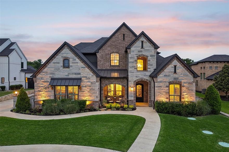 Discover a luxury lifestyle property designed for comfort, function, and elevated outdoor living. Situated on an expansive .895-acre lot, this 4-bedroom, 4 full bath, 2 half bath residence offers 4,345 sq ft with thoughtfully designed spaces throughout.
Inside, the home features wood-look tile extending through most of the first floor, plantation shutters, and dramatic 22-foot ceilings complemented by a sweeping iron staircase.  The kitchen is equipped with gourmet KitchenAid appliances including a Chef's 5 burner gas cooktop, double ovens, wine bar, under cabinet lighting, creating a well-appointed space ideal for daily life and entertaining. Escape to the spacious primary suite offers dual walk-in closets, a large shower, and dual vanities. All bedrooms are generously sized and include ensuite bathrooms, sizable closets, and built-in dressers, providing both privacy and functionality.
The outdoor oasis is a true standout! The custom 30,000 plus gallon pool reaches approximately 10 feet deep and includes color-changing LED lighting, a cave grotto with table and speakers, and a jumping platform with stairs. Additional features include a tanning ledge with bubblers, roll neck spa, travertine coping, borate water and UV sanitation system with electronic chemistry monitoring and feeders. The outdoor shower with hot and cold water enhance the backyard’s functionality and comfort. The oversized two-car garage is equipped with epoxy floors, insulated garage door, built-in cabinets and work benches, color LED lighting.  You will love the efficiency from the foam encapsulation and tankless water heaters
The large lot provides usable space with potential for additional improvements such as a shop or accommodating horses, offering flexibility for a variety of uses. Located in North Keller with no HOA, this property is conveniently near Southlake Town Square, major freeways, and Dallas Fort Worth International Airport.