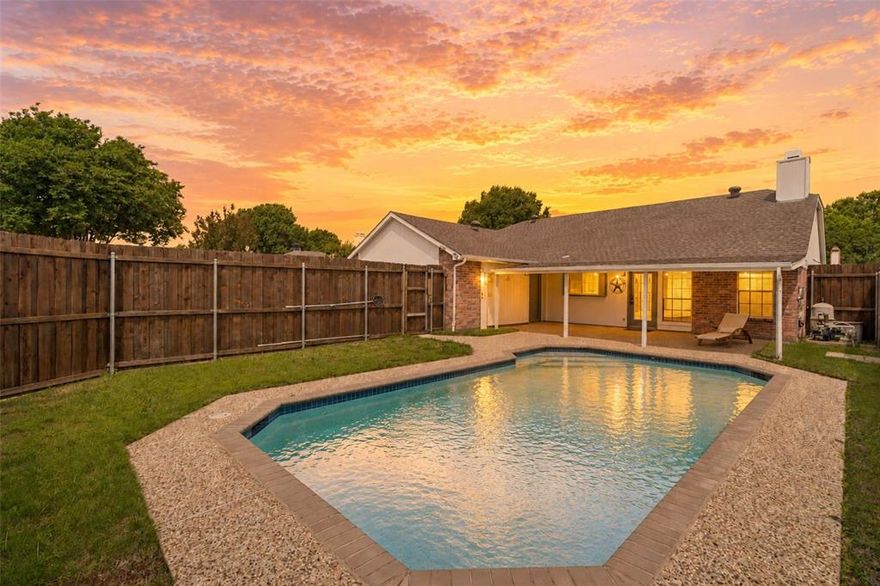 Beautifully updated 3-bedroom, 2-bath single-story home with pool, designed for comfortable living and entertaining. Light-filled open layout with vaulted ceilings, spacious living areas, and a striking brick fireplace. The front living area flows seamlessly into the main living and dining spaces, creating a cohesive feel. Dining area features a dry bar with built-in cabinetry and connects to the updated kitchen with quartz countertops, white cabinetry, subway tile backsplash, breakfast nook, and two walk-in pantries. Spacious primary suite with high ceilings, walk-in closet, and ensuite bath with dual sinks, jetted tub, and separate shower. Secondary bedrooms offer ample storage. Engineered hardwood floors throughout, fresh paint, updated lighting and hardware. Large covered patio overlooks a private play pool with new booster pump. HVAC 2023. No HOA. Ideally located near top shopping, dining, and everyday conveniences.