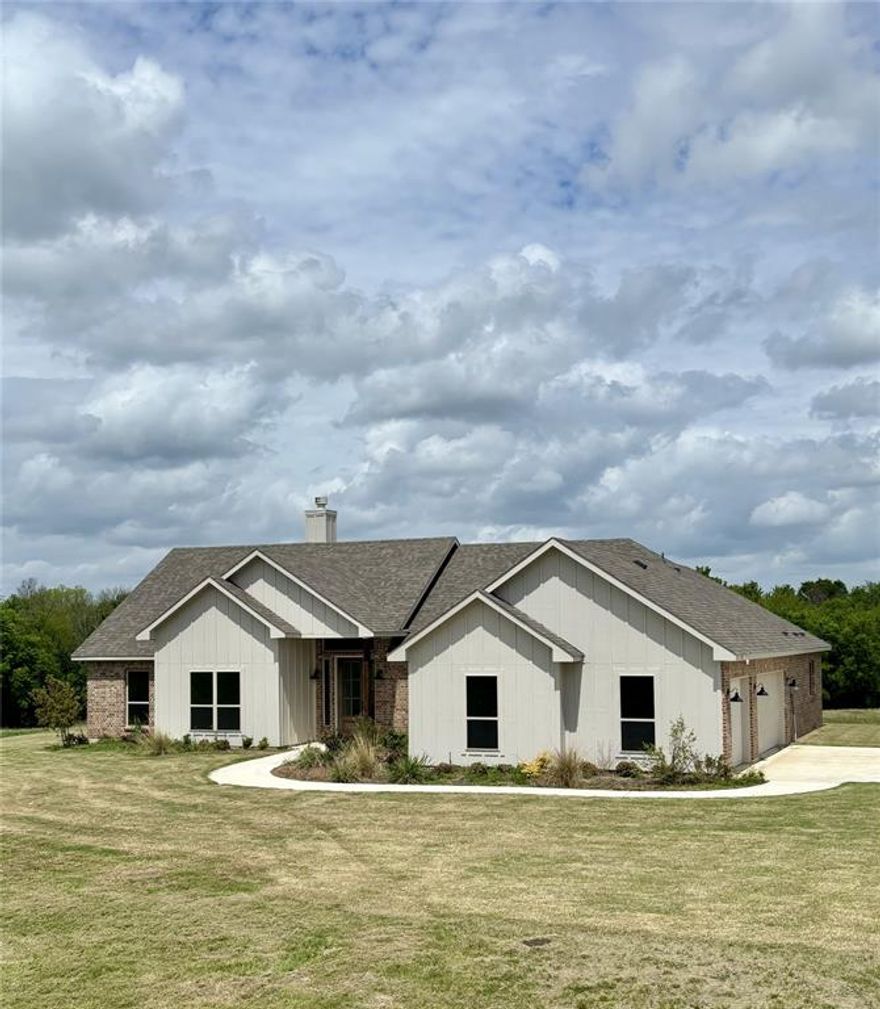 Discover Your Dream Home in Lone Oak, Texas!
Step into this stunning new construction home that offers the perfect blend of comfort, luxury, and privacy.  With 4 spacious bedrooms and 2 beautifully appointed baths, this home features an open floor plan designed for county living.
The heart of this home is the kitchen, complete with custom cabinets, granite countertops, and an oversized island perfect for meal prep and entertaining. Equipped with double ovens, stainless-steel appliances, and a generous walk-in pantry, this kitchen is a family’s dream. It overlooks a large family room with a beautiful fireplace, creating the perfect setting for cozy gatherings.
Set on 10+ acres, this home is perched on a small hill, offering private views from the master bedroom, family room, and kitchen-dining area. Whether you’re enjoying a cup of coffee in the morning or unwinding at sunset, the views are simply spectacular.
The oversized 3-car garage provides ample space for your vehicles and all your outdoor toys, making it easy to store everything you need for country living.
This is truly a one-of-a-kind property that combines modern amenities with serene country living. Don’t miss out on the opportunity to make this exceptional home yours. Schedule your private showing today!