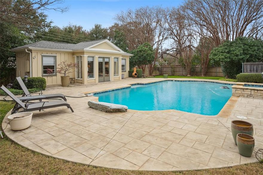 BEAUTIFULLY SET on a HALF ACRE lot and CURATED TO PERFECTION!  GUEST QUARTERS facing the POOL & SPA, great for casual living and entertaining.  The circular flow is an asset for larger scale entertaining. Well appointed with gleaming HARDWOOD FLOORS, fresh neutral paint, PLANTATION SHUTTERS, ENERGY-SAVING WINDOWS,  REMODELED KITCHEN & BATHS, LED LIGHTING, and a popular floorplan with a split bedroom and ensuite bath!  The kitchen offers a large island with a vegetable sink, an abundance of drawers and cabinets, accent lighting, upgraded stainless appliances with a WOLF GAS COOKTOP and a wine cooler.  Casual dining at the island or at the nearby breakfast bar that adjoins the family room which offers a wet bar and a brick fireplace.  The primary suite offers a view of the fabulous backyard and includes a renovated large shower with a skylight.  There's plenty of play yard for children or pets to enjoy.  The guest quarters are not included in the square footage.