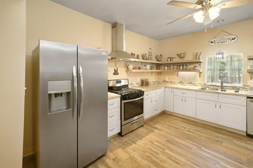 Use of Preferred  Lender will offer to pay .75 points of buyer’s closing costs. Call TODAY to see if you Qualify! 
UPDATED and Charming 2 bed, 1 bath farm house! The remodel included plumbing, electric and New ROOF, flooring, cabinets, appliances and fixtures! Upon walking in you are greeted with wood like floors that cascade throughout the house giving you a seamless feel and modern touch! Your large living room is the center of the home and flows into your over size dining room and massive Kitchen that hosts updated Shaker style kitchen cabinets, SS appliances, open shelving and custom pantry to tie the space together! The two bedrooms are of great size and are nestled behind the living room for added privacy with the shared bathroom opening up to the master and living room for easy access! Outback you are greeted with a covered porch that is perfect to take the day in or open up your personal party barn to host your next gathering! Attached to the party barn is a workshop area that is ready to store your next project. The yard is large and gives plenty of room to run and play or kick back and relax! Don't miss this charming home!