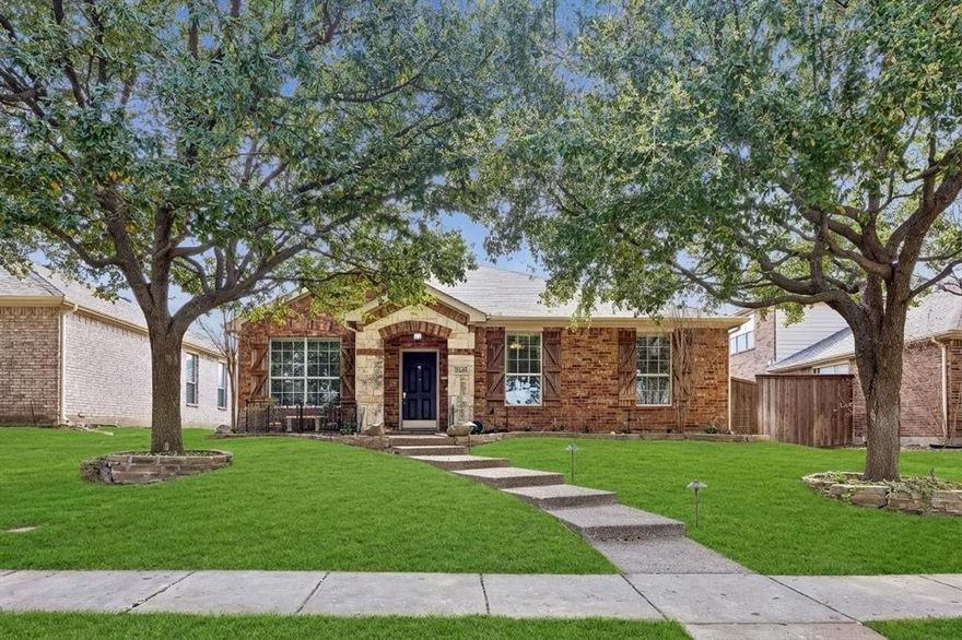 Nestled in highly sought-after Grayhawk in West Frisco, this thoughtfully updated home offers the perfect blend of comfort, style, & everyday functionality. Ideal for any buyer looking to simplify without sacrificing space, the flexible layout lives beautifully.  Step inside to warm hand-scraped hardwoods in the front living area & engineered wood flooring throughout the bedrooms, creating a cohesive & inviting feel. A dedicated study with double doors offers the perfect work-from-home space, plus an additional flex room with unlimited possibilities. The updated kitchen perfect for everyday living & hosting, featuring granite countertops, stylish cabinet hardware, a double convection oven, and a 5-burner gas range. A functional island with drawer storage and open shelving adds both practicality and personality. The kitchen flows seamlessly into the expansive family room and dining area, creating one large gathering space ideal for family time or entertaining friends. The secondary bath features updated shower tile, vanity, mirror, lighting, granite counters, and fixtures. In the primary suite, enjoy a fully updated separate shower with designer tile and glass surround, along with a double vanity topped with granite and updated lighting and fixtures. The primary bedroom is privately tucked away from the secondary bedrooms. Behind the scenes, valuable updates include a new water heater (2024), freshly stained fence, and a new garage door opener. Step outside to a backyard designed for easy living and fun. The covered pergola and extended patio create the perfect outdoor retreat, while the maintenance-free turf means no mowing. A fun bonus feature is the private putting green along the side of the home, perfect for practicing your short game or enjoying a relaxing evening outside. Located in an amenity-rich community with multiple pools & playgrounds, & just minutes from the DNT, shopping, & dining, this home offers a lifestyle of convenience & connection.