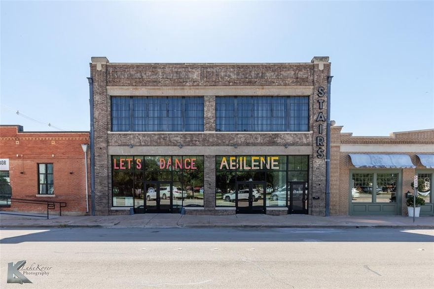 This beautifully renovated 13,500 sq.ft. building in the heart of South Downtown Abilene has four leasable spaces, three of which are leased & generating $6,926.00 base rents per month. The monthly lease amount jumps to $7,426.00 per month in September 2025 with potential for an additional $2,800 base rent per month once the fourth space is leased. The current tenants are two dance studios in the lower front & The Stairs bar and music venue upstairs. The remaining 3,375 sq. ft space is actively for lease (MLS #20792543). A new owner could occupy this remaining available space or lease to a new tenant & own the building as a more passive investment. All current leases are NNN. 

Improvements to the building include new roof, new HVAC, ADA restrooms in each space, new electrical, new plumbing, new windows, insulated ceiling tiles, new paint & new flooring. This is a great property in the up-and-coming SODA District (South Downtown Abilene). With the recent sale of 833 S. 1st as the future home of Angry Cactus Abilene & the sale of 901 S. 1st (Lauren Building), this property is a solid investment!