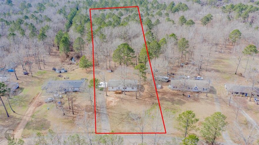 HOME FOR SALE WITH ACREAGE IN BENTON!!!!! This 3-bedroom, 2-bathroom, 1,800 square foot home is ready for its new owners! Situated on 3.58 acres, this home offers ENDLESS possibilities! Country living at its finest, with the option for ALL the recreational adventures one can dream of, as it is moments away from Cypress Lake and Recreation! Upon entering the home, you are greeted with lovely luxury vinyl flooring and an open floor plan perfect for entertaining! This home has been ENTIRELY remodeled inside and out! Some of the updates include NEW paint, NEW flooring, and NEW decorative lighting! The living room offers an inviting aura with the electric fireplace. The kitchen is a DREAM, boasting a large island with granite countertops, a farmhouse sink, NEW stainless-steel appliances, and decorative backsplash that will look beautiful with your decor! The remote primary suite presents and ambience of relaxation, and the primary ensuite bathroom emits the same vibes! Showcasing an oversized soaking tub, a separate shower, and a huge walk-in closet, this will be one of your FAVORITE rooms to experience! Host family and friends with the spacious acreage this property provides, and enjoy the new carport, and the deck for your morning coffee as you sit back and enjoy what nature has to offer! Schedule your showing for this AMAZING property today!