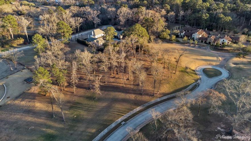 1.801 acre lot for sale in exclusive Esplanade Subdivision.  Located on quiet cul-de-sac with extremely low traffic.  High topography offers a substantial amount of privacy.  Close to south gate which allows easy access to Ellerbe Road. 
*****SELLER IS WILLING TO SUBDIVIDE 1.801 ACRE LOT TO ACCOMODATE BUYER, BETWEEN .8 ACRES AND 1 ACRE.*****