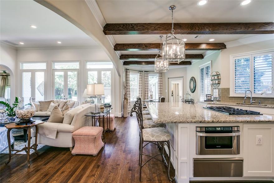 Fabulous transitional gem in the middle of Preston Hollow! Tastefully updated and meticulously maintained, the bright, airy and open floor plan creates the perfect backdrop for entertaining and casual family gatherings. The 1st floor provides the perfect space for day to day living - a beautiful living area open to the kitchen with wet bar, 2 dining areas, bedroom-office, and luxurious master suite retreat with spacious custom closet storage system and 2 water closets. The 2nd floor is the ideal space for children, grandchildren or guests with 2 bedrooms, 2 baths, and living area.  The beautiful backyard is a peaceful oasis for dining and relaxation. This home has everything you need to create a warm and serene haven for work, play, and outdoor living.