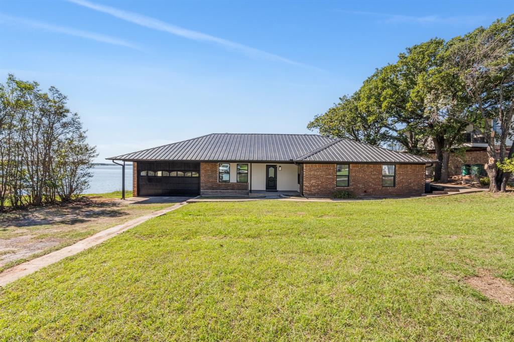 Photo of 1107 Casino Road, Nocona, TX 76255 (MLS # 21420449)