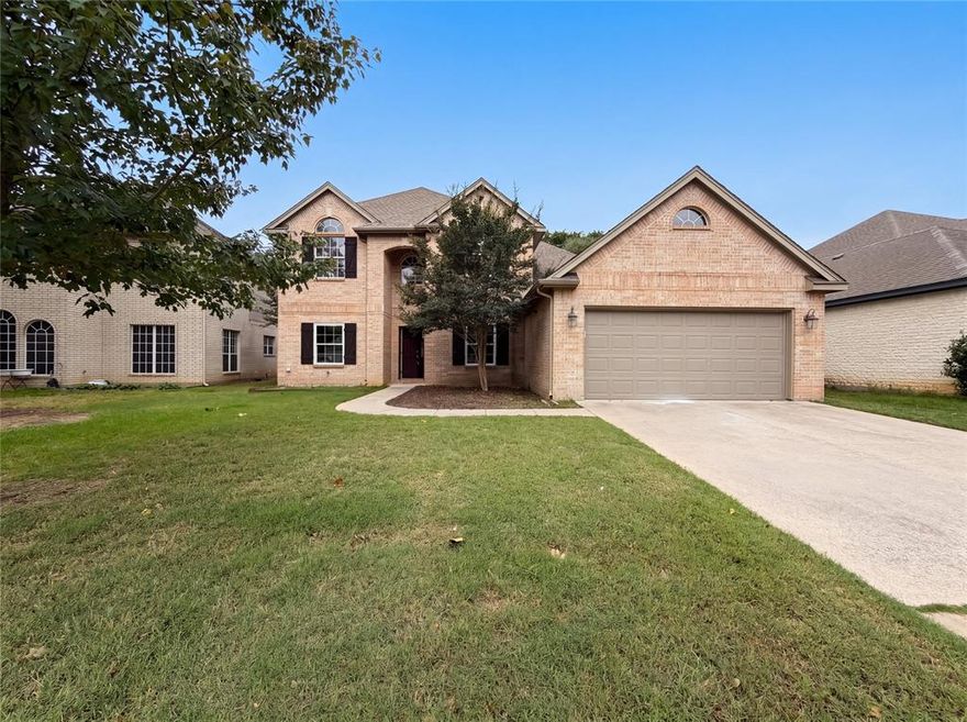 Picture yourself at 6218 Kingswood Dr, a residence recently enhanced with fresh interior paint throughout. The kitchen includes all stainless steel appliances, complementing a comfortable living area with a fireplace. The primary bathroom features double sinks, a separate tub, and a shower, while the exterior provides a covered patio leading to a fenced in backyard and storage shed.  This home brings together modern updates and everyday comfort in one move-in ready package. Home comes with a 100-Day Home Warranty and a 7-Day Home Test Drive to move in 7 days early for free