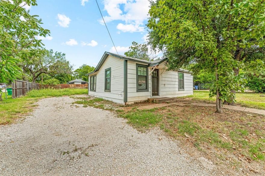 Welcome to this charming small-town home in the heart of downtown Graham, TX. Nestled on a large .25-acre lot with new laminate floors and carpet already in place and just a little TLC needed; with so much charm and character it’s the perfect choice for a small family or anyone looking for an affordable home with income-producing potential. Just minutes from the historic Downtown Square — the largest in America — you’ll be able to enjoy local shops, dining, and year-round community events right at your doorstep. Graham also offers the beauty of nearby parks, trails, and lakes, including Lake Graham and Possum Kingdom Lake, making it easy to spend weekends fishing, boating, or enjoying the outdoors. This home combines small-town charm with endless possibilities, priced to sell and ready for your vision. Schedule your showing today and see the potential for yourself!