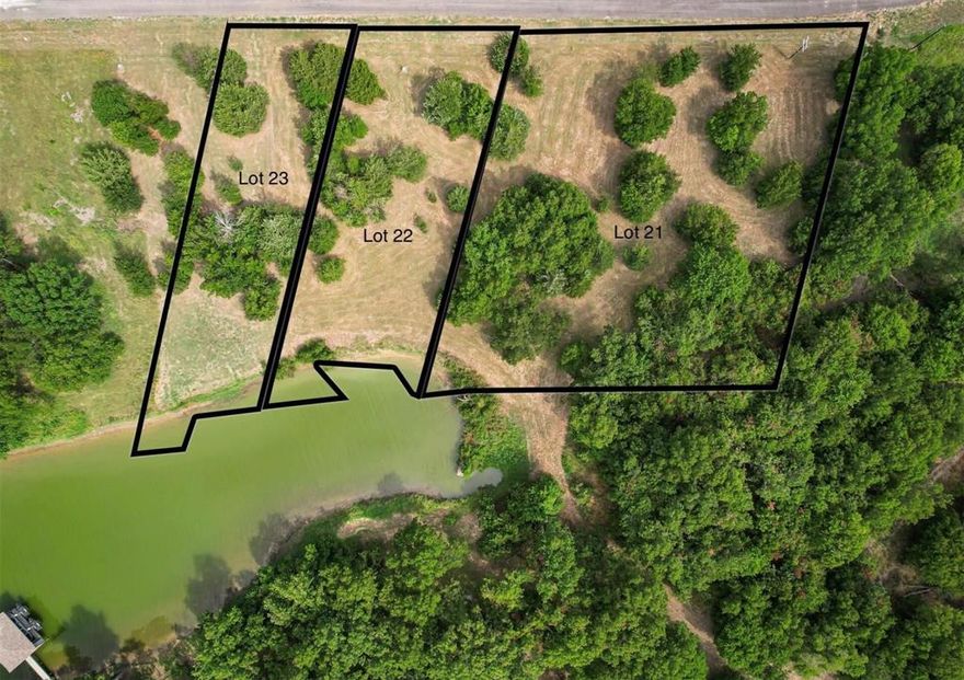 The lake is full and Lots 21, 22, & 23 in BayBridge is ready for you to build your dream home! Located just over an hour from Dallas on the stunning Richland Chambers Lake—the fifth-largest lake in Texas—this property offers access to over 40,000 acres of open water for endless lake days filled with boating, fishing, and relaxation. BayBridge is a gated community with a 2,000 sq. ft. minimum build requirement, but there’s no timeline to start construction—giving you the freedom to build at your own pace. Situated in a protected cove with over six feet of water depth just off the shoreline, this lot is ideal for swimming, fishing, or building your own private boat dock. Looking for more space? Don’t miss this incredible opportunity to create your perfect lakeside retreat on beautiful Richland Chambers!