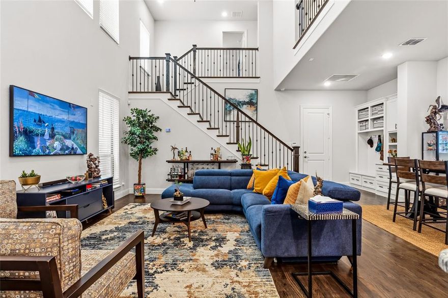 Rare opportunity to own a highly upgraded quality built Taylor Morrison home, backing directly to a secluded greenbelt and trail .Offering scenic views and added privacy that few homes in the neighborhood provide.Designed for both everyday living and entertaining, the open-concept layout flows seamlessly from spacious living areas into a chef-inspired kitchen featuring an oversized granite island, custom cabinetry, farmhouse sink, upgraded appliances, and gas cooktop. Natural wood flooring adds warmth and elegance throughout the main level.A dedicated media room wired for surround sound and a projector creates the perfect movie-night retreat, while the bonus loft offers flexible space for a home office, library, or second living area.
Custom staircase finishes and thoughtful upgrades throughout reflect true model-home quality. The 2.5-car garage includes built-in storage racks for added functionality.Ideally located with convenient access to DFW Airport, major highways, shopping, dining, and downtown.
Homes with this combination of upgrades, privacy, and location rarely become available.