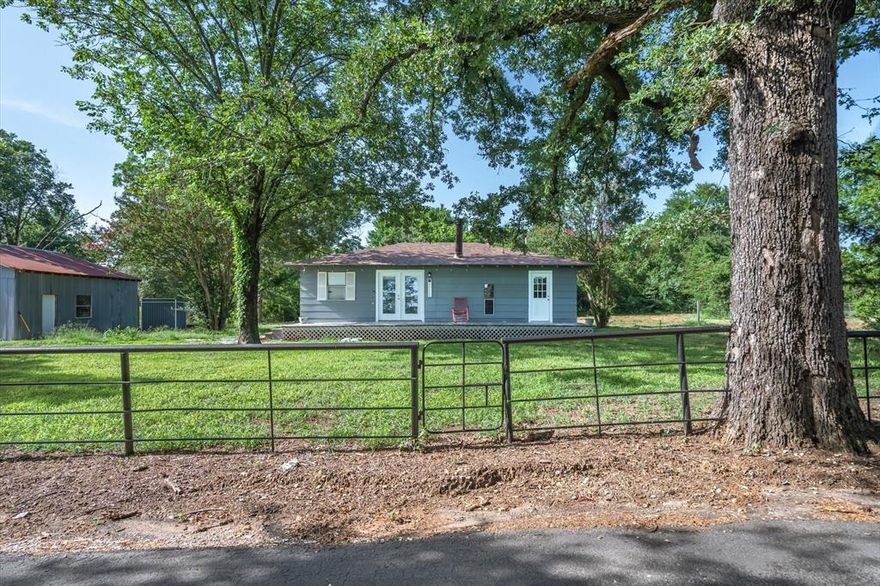 Recently remodeled country gem sitting on approximately 1.5 acres. This 3-bedroom, 1-bath home offers the perfect mix of comfort and functionality. Enjoy peace of mind with a roof that's only about 3 years old and fresh updates throughout—flooring installed July of 2025. The spacious layout features a living area with a ready-to-install wood-burning stove or fireplace—chimney already in place—and a cute coffee bar by the door to get you ready for those busy mornings. Step outside to find a large shop ideal for projects, storage, or hobbies. The property includes partial perimeter fencing and access to a shared pond, perfect for enjoying quiet country evenings. Located in Grand Saline ISD, this property offers rural charm with convenience. Whether you're looking for your first home, a weekend retreat, or a place to grow, this one should check all the boxes!