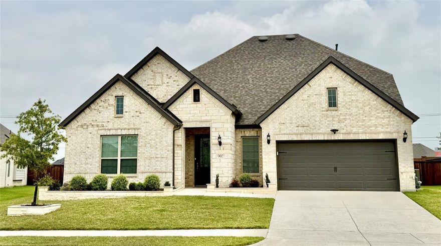 Step into this beautifully maintained home featuring an open, airy layout with large windows, rich wood floors, and soaring cathedral ceilings that fill the space with natural light. Inside, you'll find generously sized rooms throughout, perfect for comfortable everyday living or hosting. The kitchen is both stylist and functional, featuring granite countertops and chef's island ideal for cooking, entertaining, or casual dining. Outside, enjoy a large backyard with planted magnolia trees, offering plenty of space for relaxing, gardening, or entertaining. Perfectly located near restaurants, hospitals, grocery stores, schools, popular entertainment like Hawaiian Falls Mansfield, and just minutes from main highway, this home blends timeless charm with everyday convenience. This property presents a wonderful opportunity to experience comfortable and convenient living.