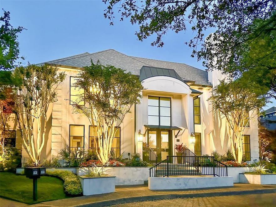 Act fast—this modern masterpiece won’t last long! Completely reimagined in 2020, this home features sleek mortared brick, new entry doors, and thermal pane low-E glass windows. Inside, soaring ceilings, gleaming hardwood floors, and expansive formals with a wet bar create an entertainer's dream. The chef's kitchen includes a Butler's Pantry, Scullery kitchen, and main kitchen equipped with Wolf, SubZero, and Asko appliances. The Primary Suite on the South wing boasts a sitting area, fireplace, walk-in closet, and coffee bar. The central outdoor living area features conservation grass, a dining space, and a gas grill. Upstairs, find a second Primary Suite, additional ensuite bedroom, study, and a media-game room with kitchenette—perfect for multi-generational living. This home, with its 2020 updates including a new roof, LED lighting, and EV-ready outlet, lives like new!