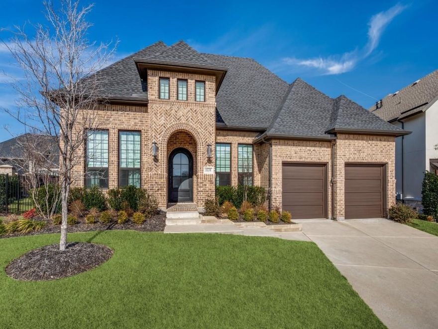 ~Stunning One Story built by Toll Brothers, located in the Gated enclave of Paradiso Valle in Stonebridge Ranch. Built in late 2023, this home offers the feel of new construction without the wait. The wide one fourth acre lot is strategically situated beyond the greenway. Extensive landscaping and modern curb appeal create an inviting welcome from the moment you arrive. The grand double foyer entry, pantry bath, and executive office lead seamlessly to an open concept layout connecting the living room, kitchen, dining, and the outdoor living space, making it ideal for gatherings. Gourmet kitchen boasts quartz countertops with a matching backsplash, a large island, a gas cooktop, stainless steel appliances, a walk in pantry, and a utility room. Step outside to your private resort-style backyard oasis featuring a sparkling pool and spa, an extended covered patio with motorized  solar screen, stone retaining walls, and an outdoor grill, making it the perfect setting for relaxing or entertaining. Every detail has been thoughtfully curated, from custom blackout drapery and roman shades to stunning designer light fixtures and wood beam accents. The private primary suite overlooks the backyard retreat and features a spa-inspired ensuite bath with an oversized walk-in-shower with frameless glass, dual vanities, soaking tub and a large walk in closet. Spacious secondary bedroom suites provide comfort for family or guests. The 3 car garage features epoxy flooring. This exceptional home blends luxury, comfort, and modern convenience all in one of McKinney's most sought after communities.