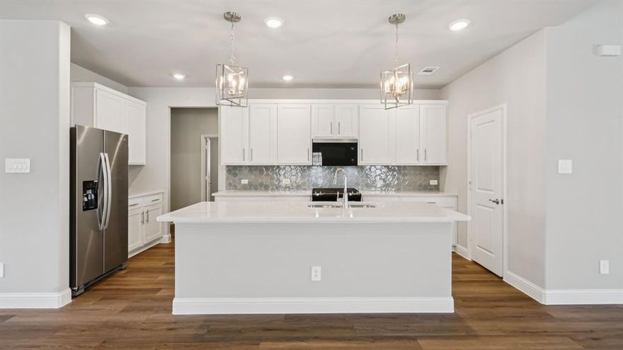 BRAND NEW energy - efficient home Jul 2025! Try a new recipe in the Woodside’s impressive kitchen, complete with a useful island and large pantry. White cabinets with veined white quartz countertops, beige tone EVP flooring with beige tweed carpet. FROM THE LOW $300s - New energy-efficient move-in ready homes in Dallas-Fort Worth include a washer, dryer, fridge, and whole home blinds, plus they can be closing-ready in 60 days or less–guaranteed. Discover it all: Relax in your private primary suite, enjoy the covered back patio, and experience resort-style amenities including a pool, playground, fitness center, and basketball court, all with easy access to Princeton, McKinney, and Frisco.