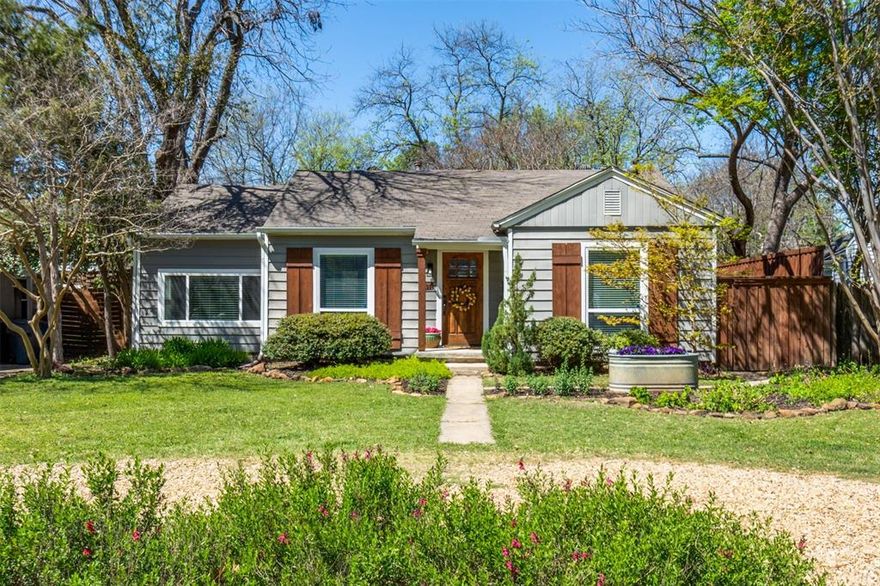 Charming and quaint, this beautifully maintained cottage is nestled in the heart of Little Forest Hills—one of East Dallas’ most vibrant and sought-after neighborhoods. Set along picturesque, tree-lined streets, the home is just a short walk to White Rock Lake and the Dallas Arboretum, offering the perfect blend of nature and city living. Inside, you’ll find fresh paint and rich hardwood floors throughout which enhances the home’s warm, inviting cottage feel. The kitchen is both stylish and functional with stainless steel appliances, butcher block countertops, subway tile and decorative lighting. The recently renovated bathroom includes extra storage. Elfa closet systems in two of the bedrooms provides smart organization throughout the home. The backyard is truly special—a gardener’s dream with a certified Monarch Waystation designed to support butterflies during their migration. A spacious deck extends the living area outdoors, making it perfect for relaxing or entertaining. There is a detached studio with an AC unit  in the backyard as well offering incredible flexibility, ideal for an office, gym, or an art studio. Refrigerator, washer, and dryer all convey with the property. A rare opportunity to own a charming home in one of East Dallas’ most cherished communities.