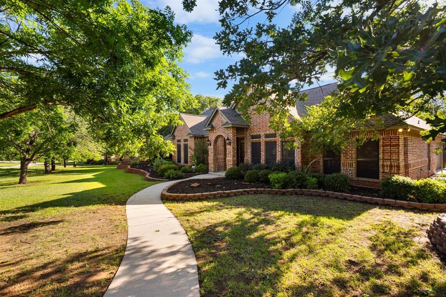 This beautiful brick home on 1.44 acres features a backyard oasis, a newly remodeled kitchen, and expansive covered parking. Nestled on the highly coveted Shady Creek Lane in Bridgeport, TX, it is walking distance from the Bridgeport High School and is brimming with features. With an inground pool, game room, an extra tall covered carport (big enough for two full-sized RVS), a covered porch, and an attached two-car garage, this home is the crown jewel of the neighborhood and harbors enough space for everyone in the family and their toys! This 4 bed, 3 bath masterpiece offers an open concept with abundant natural light, gorgeous, stained concrete floors, and views of its serene wooded lot.