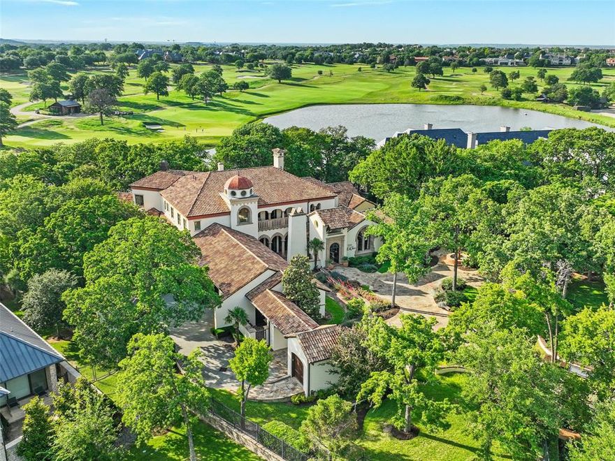 WOW!  Nestled within the coveted Private Enclave of Gated and Guarded community of Vaquero in Westlake, this extraordinary Estate is a RARE opportunity to own one of Westlake's MOST Breathtaking properties. Situated on a sprawling 1.6+acre Homesite, this exclusive residence offers unmatched privacy, serenity & spectacular Views overlooking a tranquil Pond & the picturesque 15th Hole of Vaquero’s Championship Golf course. From the moment you enter the private gate into the motor court, you are greeted to a private Courtyard featuring timeless Architecture & impeccable Craftsmanship. Rich in character & elegance & adorned with the highest quality Finishes throughout, this home reflects refined taste & sophisticated design. Features include flanking French doors from front to back w Breathtaking VIEWS, intricate Marble inlaid floors, Wood flooring, Venetian plaster, custom wood planked Ceilings and extravagant Cast Stone fireplaces.  The private Master Retreat boasts custom finishes including Bay Windows, custom Cast Stone fireplace, Wet Bar, marble flooring & countertops w Antique Mirrors + 2 sep closets. The 1st flr is equipped w 2 elaborate finished Studies, 2 Powder Baths, sub-grade Wine Cellar, Chef's Kitchen + Keeping Room, Elevator + spacious Laundry. Upstairs has 2 large private Bed Suites, Game-Media, Exercise and large Balcony Patio w unmatched Views. Attached to the home is a beautifully-detailed private Guest Quarters w bdrm, sitting area, kitchenette + laundry.  4 car + golf cart garage. Backyard of your dreams with outdoor Din-Liv, FP, Pizza Oven, Spa, Fire pit, Putting Green & tons of trees. This estate seamlessly blends indoor & outdoor Liv and expansive spaces designed for both grand Entertaining & intimate everyday moments. Enjoy Sunsets from the patio, relax by the Pond or take in the lush Golf course scenery at your own home. Every corner of this property offers a sense of peace & elevated living in one of the most Prestigious communities in Texas.